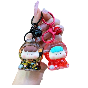 Cute acrylic quicksand keychains with stars and sequins in black and red colors