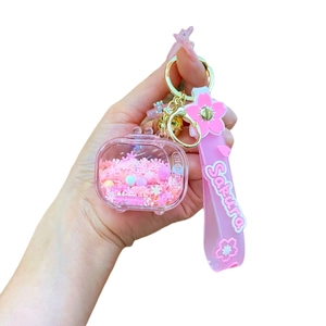 Luminous Sakura TV shaker keychain with pink silicone wristband and golden bell charm