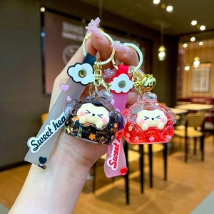 Quicksand cat acrylic keychains with floating glitter and colorful wrist straps