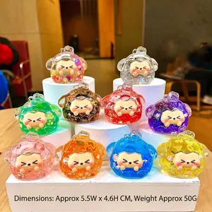 Detail showing various colors of transparent acrylic hedgehog keychains with glitter