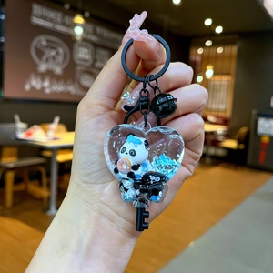 Porte-clés cœur créatif panda avec liquide de sable mouvant et paillettes bleues