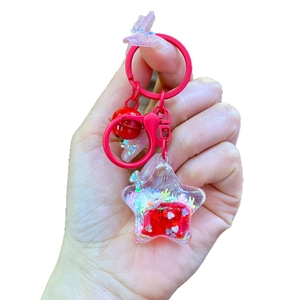 Cute red star liquid quicksand keychain with glitter hearts and pink lobster clasp