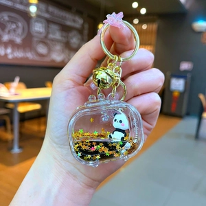 Acrylic liquid panda keychain with floating sequins and gold bell in a TV-shaped charm