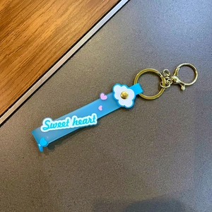 Cute light blue Sweet Heart silicone keychain with golden metal ring and floral charms