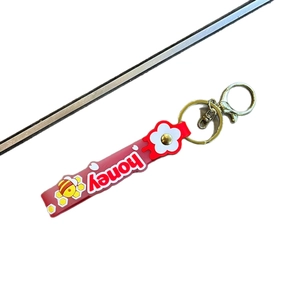 Red silicone honey bee keychain with gold metal clasp for bag charm and key organization