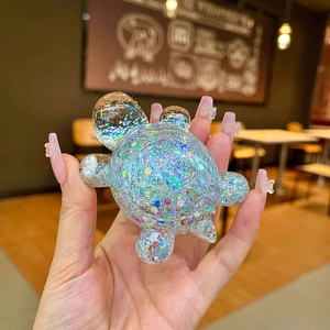 Sparkling turtle resin craft charm with colorful glitter filling for DIY desk decor
