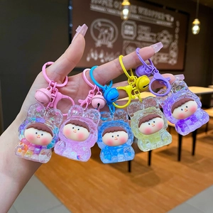 Five colorful luminous bubble bead Lilith keychains with cute floating dolls and bells