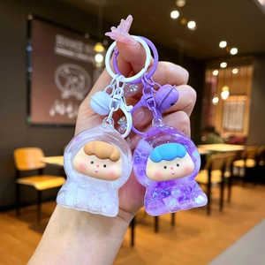Porte-clés astronaute mignon avec paillettes et cloches pour décoration de sac