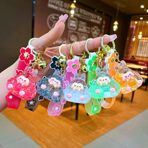 Luminous creative bunny oil quicksand keychains with wrist straps and bells in five colors