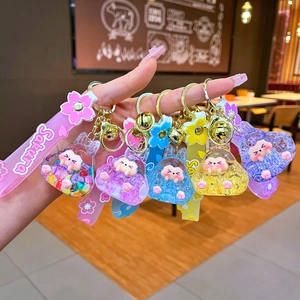 Luminous creative liquid quicksand rabbit keychain set with colorful charms and bells