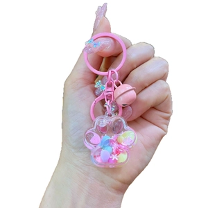 Porte-clés patte de chat rose en acrylique avec paillettes et petite cloche sonore