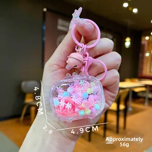 Pink liquid glitter keychain with snow sequins and dimensions showing 4.9cm by 4.8cm