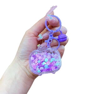 Creative purple TV-shaped acrylic liquid keychain with floating beads and glitters
