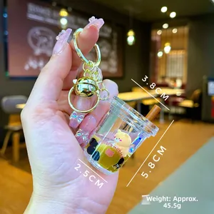 Detailed view of bubble tea keychain with floating bear and liquid sand inside