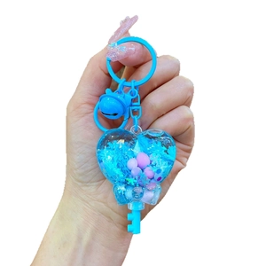 Luminous snowflake blue heart liquid quicksand keychain with bell and key charm accessory