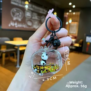 Detailed size view of panda panda keychain with gold star sequins and dimensions shown