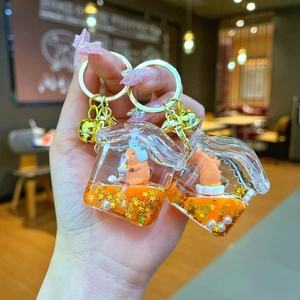 Porte-clés Capybara en acrylique en forme de maison avec paillettes et sables mouvants