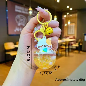 Cute cat animal liquid keychain with yellow ring and size dimensions 6.2cm by 4.4cm