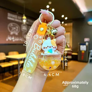 Detail shot of a liquid cat keychain showing dimensions 6.2cm height and 10.5cm lanyard