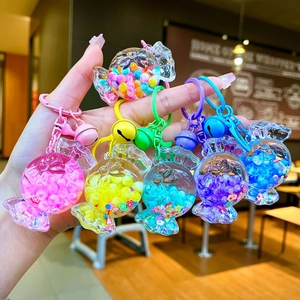 Handheld macaroon candy liquid sand keychains with colorful beads and bells