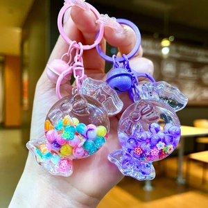 Glow-in-the-dark macaron candy pendants with liquid sand and beads for backpacks