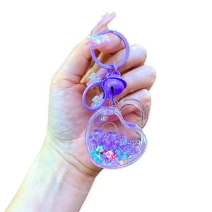 Cute purple heart liquid quicksand keychain with stars and glitter flakes for backpacks