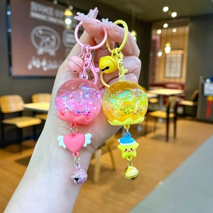Porte-clés bouteille de sable mouvant lumineux avec pendentifs cœur rose et étoile jaune mignons