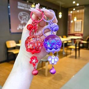 Porte-clés bouteille de sable mouvant lumineux avec paillettes et cloches mignonnes