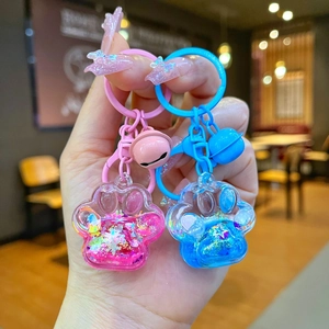 Porte-clés patte de chat avec sable mouvant liquide rose et bleu et paillettes