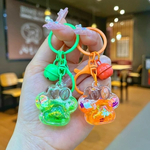 Porte-clés patte de chat avec sables mouvants liquides et petite cloche assortie