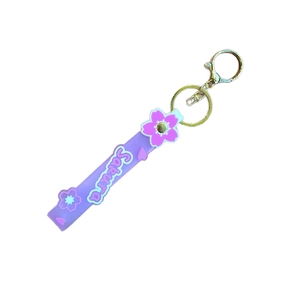 Purple Sakura cherry blossom PVC keychain with soft rubber strap and gold lobster clasp