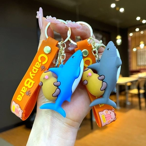Shark capybara keychain doll with orange wrist strap and metal clip hanging accessory