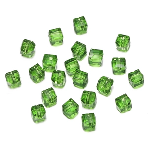 Close-up of 8mm emerald green multi-faceted crystal cube beads for jewelry making