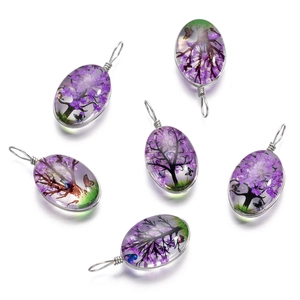 Pendentifs ovales en verre enveloppés de fil avec paysages miniatures d'arbres à fleurs
