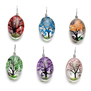 Pendentifs ovales en verre motif arbre de vie avec fleurs séchées colorées et crochets argent