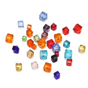 Detailed view of colorful 8mm faceted glass cube beads for DIY jewelry making crafts