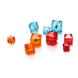 Close-up of 8mm faceted colorful crystal cube beads with vibrant light refraction