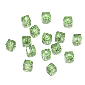 Macro shot of 8mm green faceted crystal cube beads for DIY jewelry making