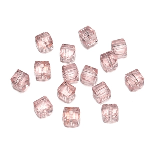 Macro shot of 8mm rose pink multifaceted crystal cube beads for DIY jewelry making