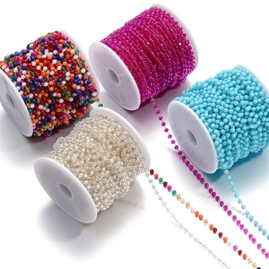 Detail of 4 rolls of 3mm crystal bead chains in colorful finishes for DIY jewelry making