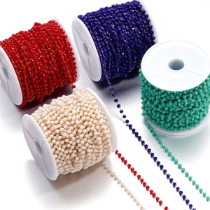 Detail of 3mm colorful crystal bead chains on spools for DIY jewelry making