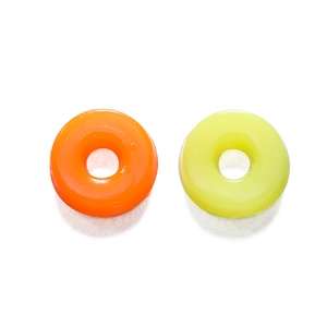 Macro detail of colorful doughnut resin beads for DIY jewelry and phone chain making