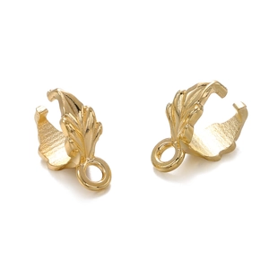 Detailed close-up of golden alloy leaf charms with intricate veins for DIY jewelry