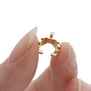 Macro shot of 8.5x11mm golden alloy leaf clasp connector for DIY jewelry making