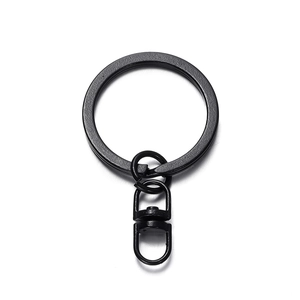 Close-up of matte black metal keychain ring with 360-degree rotating swivel base