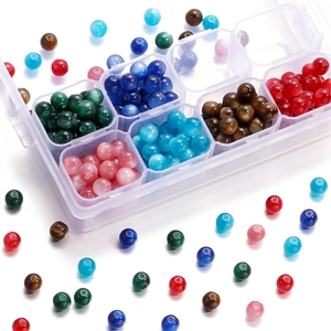 Colorful 6/8mm resin cat eye beads in a clear plastic organizer box for DIY jewelry crafts
