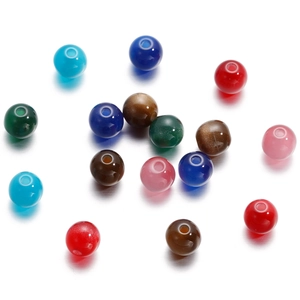 Close-up of vibrant 6-8mm resin cat eye beads in mixed colors for DIY jewelry making