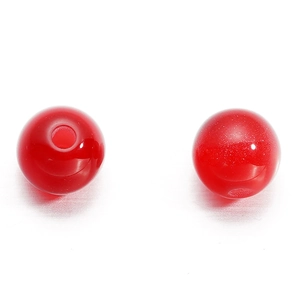Detailed macro view of two red resin cat eye round beads showing the smooth 1.5mm drill hole