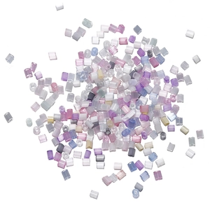 Close-up of mixed Morandi color fluted tube beads for DIY jewelry and crafts