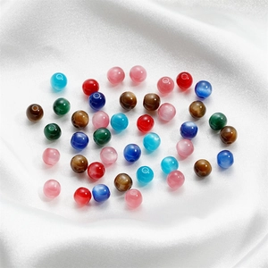 Detailed view of colorful 6-8mm resin cat eye beads for DIY jewelry making and crafts